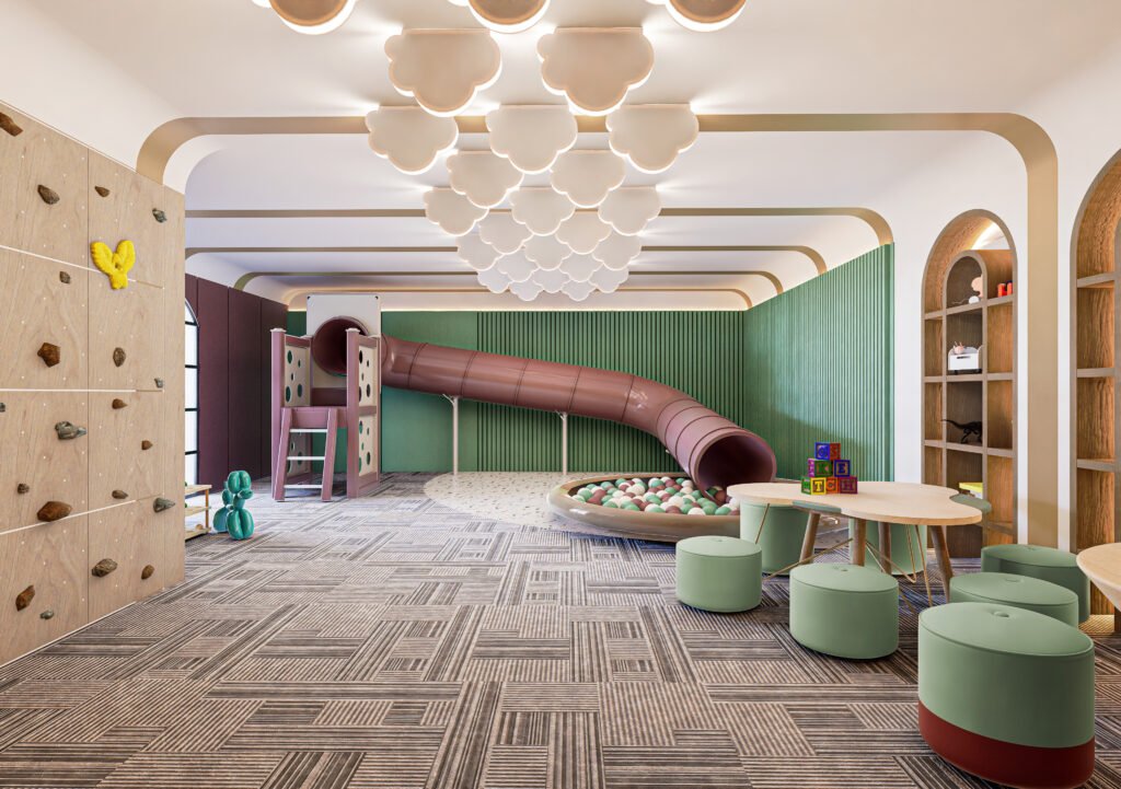 Modern open-plan office space with large windows, ergonomic chairs, and a mix of workstations and lounge areas. The room features wooden flooring, indoor plants, and contemporary decor, including a round mirror and a vibrant abstract painting.